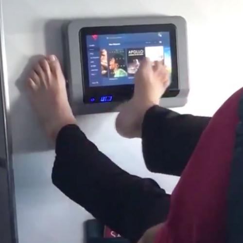 Disgusting Footage Shows Man Operating Plane TV With His FOOT!