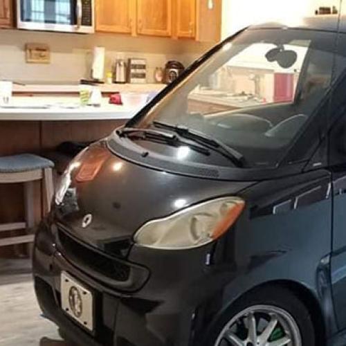 Man Parks Smart Car In Kitchen So It Won't "Blow Away"