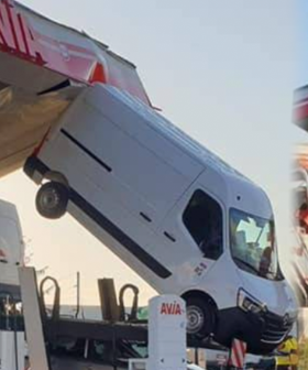 The Bizarre Reason As To How This Van Got Lodged Between The Roof And Floor Of A Servo